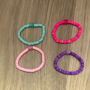 4 pc clay bead flower bracelet set